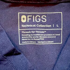 Figs scrubs, navy color, two size large jogger bottoms and two size large tops.